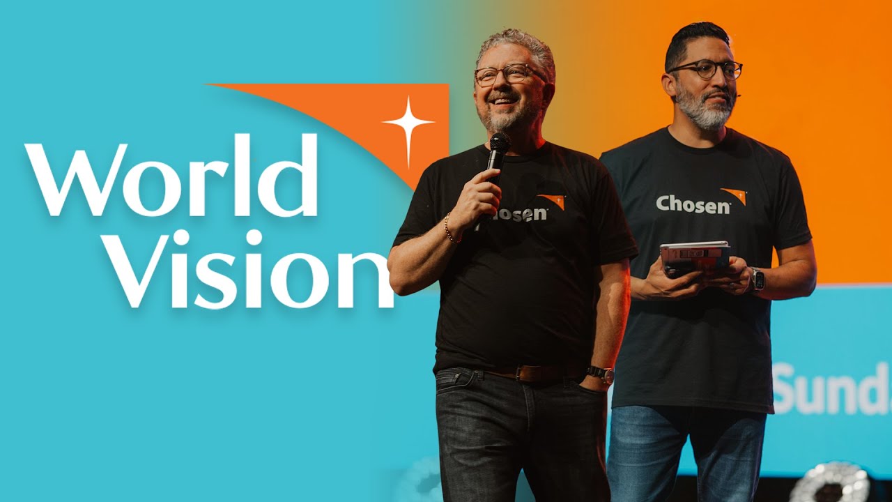 World Vision event with two speakers on stage